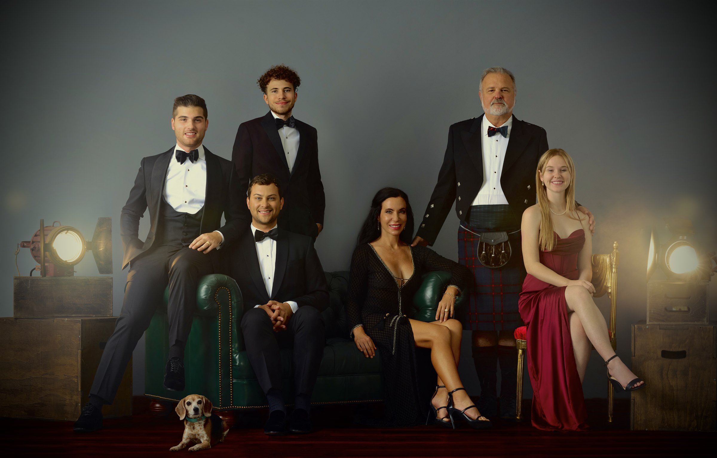 The Greenlaw family smiling together in formal attire